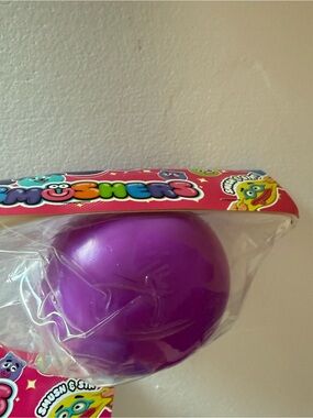 Usher Purple Squishy Surprise Ball Plush
